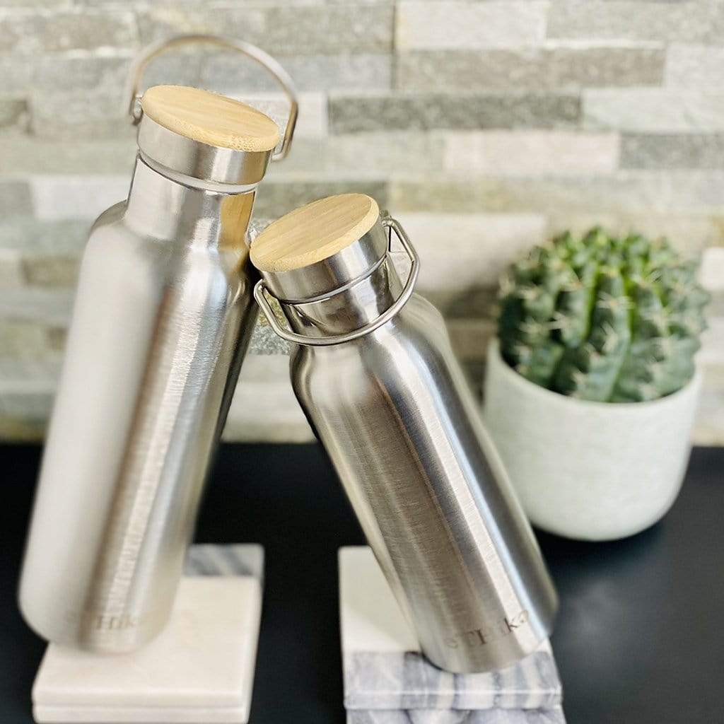 https://staiy.com/cdn/shop/products/ethika-inc-stainless-steel-double-wall-water-bottle-with-bamboo-lid-5-sizes-available-32077754695861_286eb7d2-5f67-4450-bb80-175818b6044b.jpg?v=1648477542
