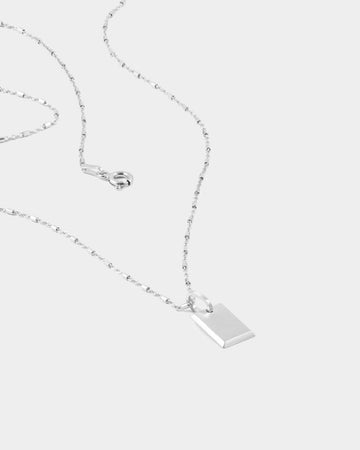 untold tag necklace